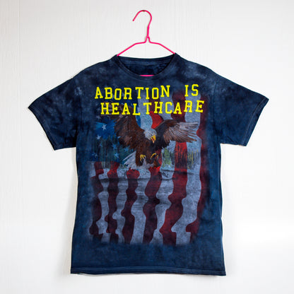 Abortion Is Healthcare Intrusive Thought Tee (Approx. Medium)